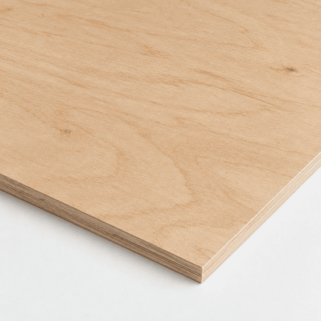 corner of a sanded plywood sheet with a smooth birch face